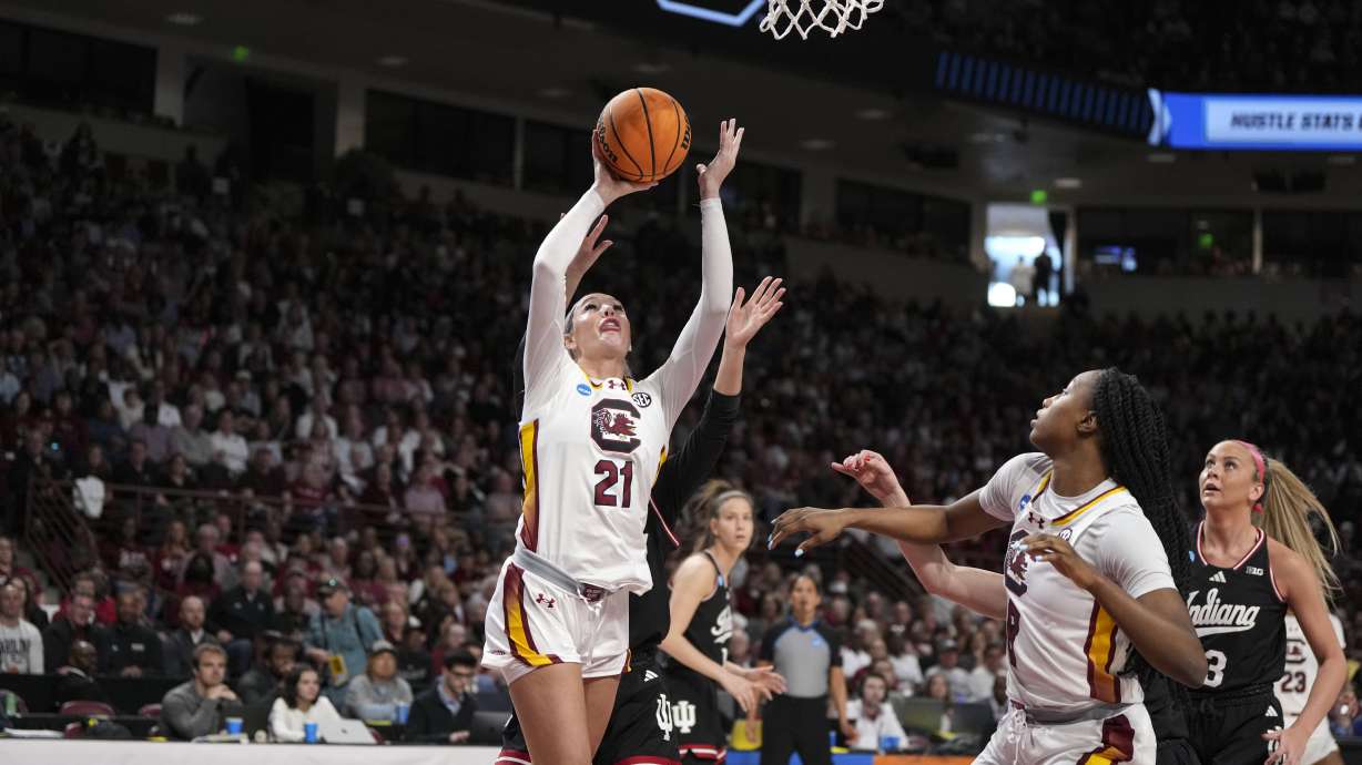 South Carolina forward Chloe Kitts (21) shoots against Indiana defenders during the first half in the second round of the NCAA college basketball tournament, Sunday, March 23, 2025, in Columbia, S.C.