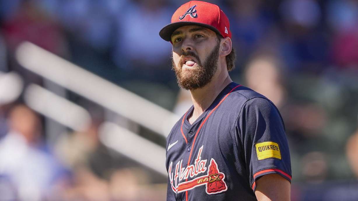 Atlanta Braves pitcher Ian Anderson walks to the dugout after being pulled in the second inning of a spring training baseball game in North Port, Fla., Sunday, Feb. 23, 2025.