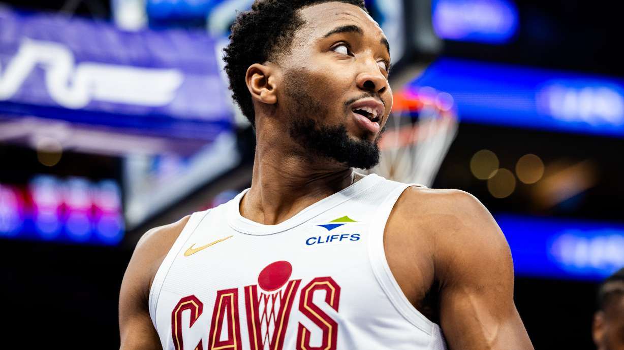Cleveland Cavaliers guard Donovan Mitchell (45) looks down the court at his teammates during an NBA game against the Utah Jazz at the Delta Center in Salt Lake City on Sunday, March 23, 2025.