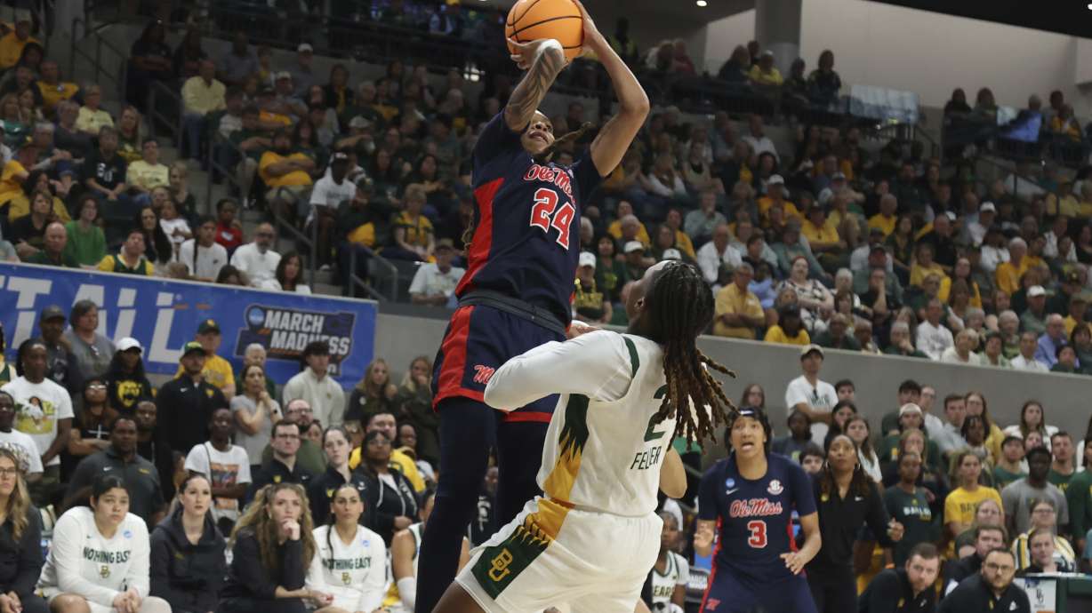 Mississippi guard Madison Scott shoots over Baylor guard Yaya Felder during the first half in the second round of the NCAA college basketball tournament, Sunday March 23, 2025, in Waco, Texas.