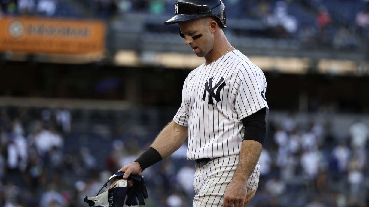 FILE - New York Yankees' Brett Gardner walks off the field after being defeated by the Tampa Bay Rays in a baseball game on Saturday, Oct. 2, 2021, in New York.