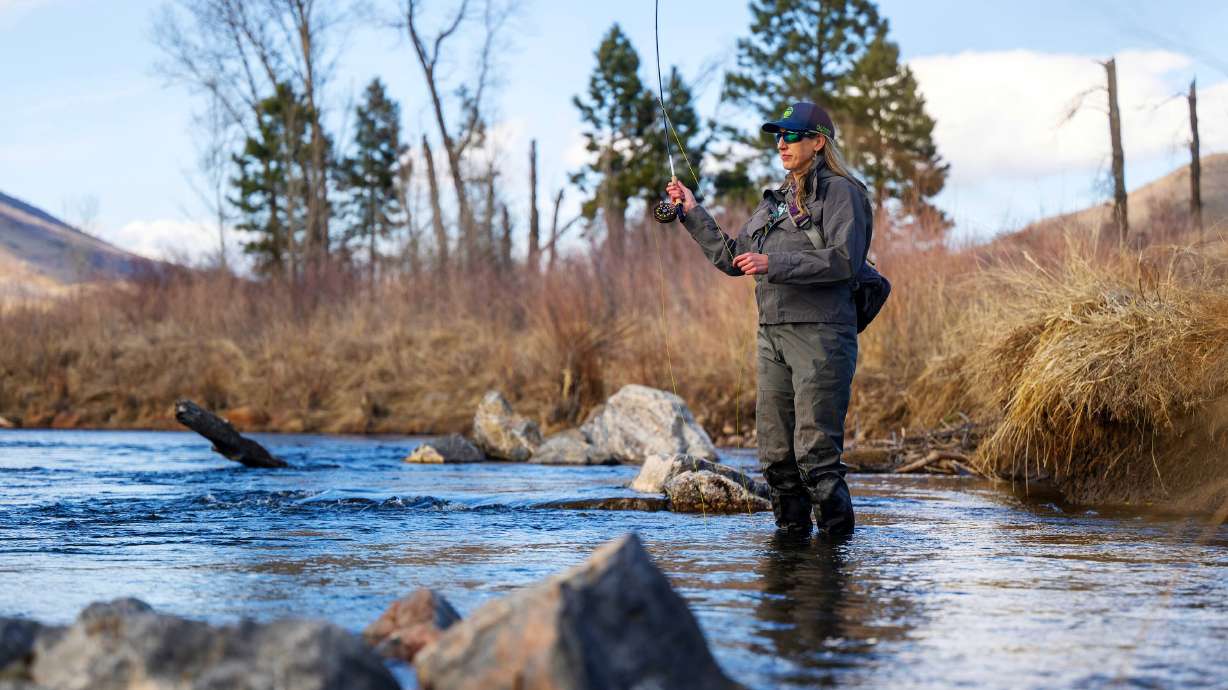 National Champion fly caster Audrey Wilson does a little fishing in the Provo River in the Heber Valley on March 12. Wilson will be conducting casting classes at the Wasatch Fly Fishing and Fly Tying Expo this weekend.