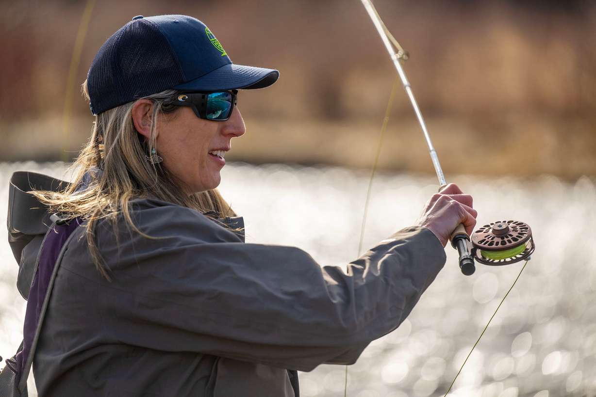 National champion fly caster Audrey Wilson does a little fishing in the Provo River in the Heber Valley on March 12.