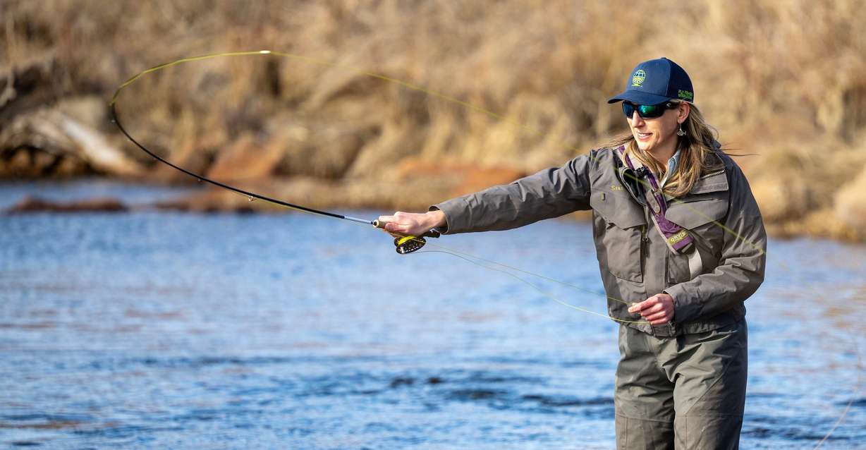 National Champion fly caster Audrey Wilson does a little fishing in the Provo River in the Heber Valley on March 12.