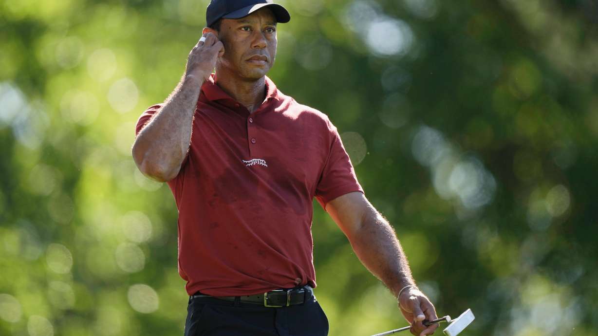 FILE - Tiger Woods walks to the green on the fifth hole during final round at the Masters golf tournament at Augusta National Golf Club Sunday, April 14, 2024, in Augusta, Ga.
