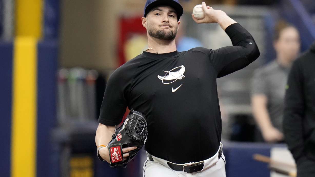 FILE - Tampa Bay Rays pitcher Shane McClanahan throws in the bullpen before a baseball game between the Rays and the Baltimore Orioles on Aug. 10, 2024, in St. Petersburg, Fla.
