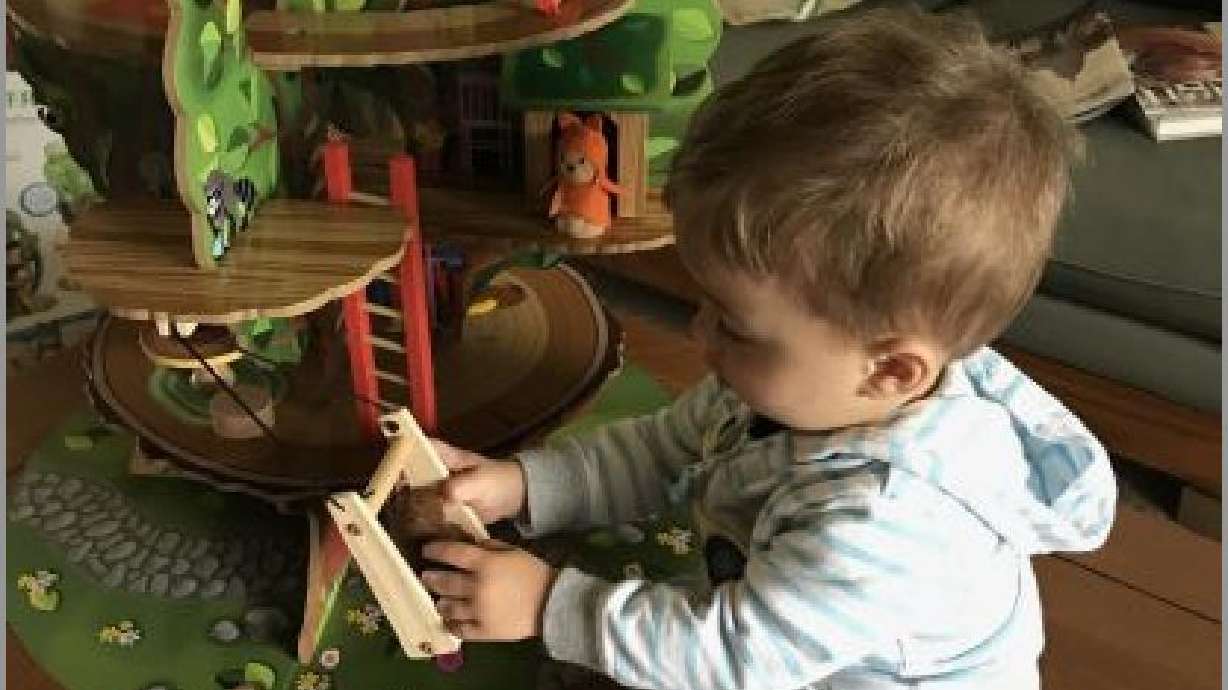 Stefanie Eskander's grandson plays with the Imaginarium Forest Friend’s Treehouse she designed and was produced by Toys R Us in 2015.
