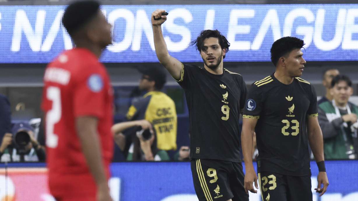 Mexico's Raul Jimenez, center, celebrates with Mexico's Jesus Gallardo, right, after he scored against Panama during the first half of a CONCACAF Nations League final soccer match Sunday, March 23, 2025, in Inglewood, Calif.