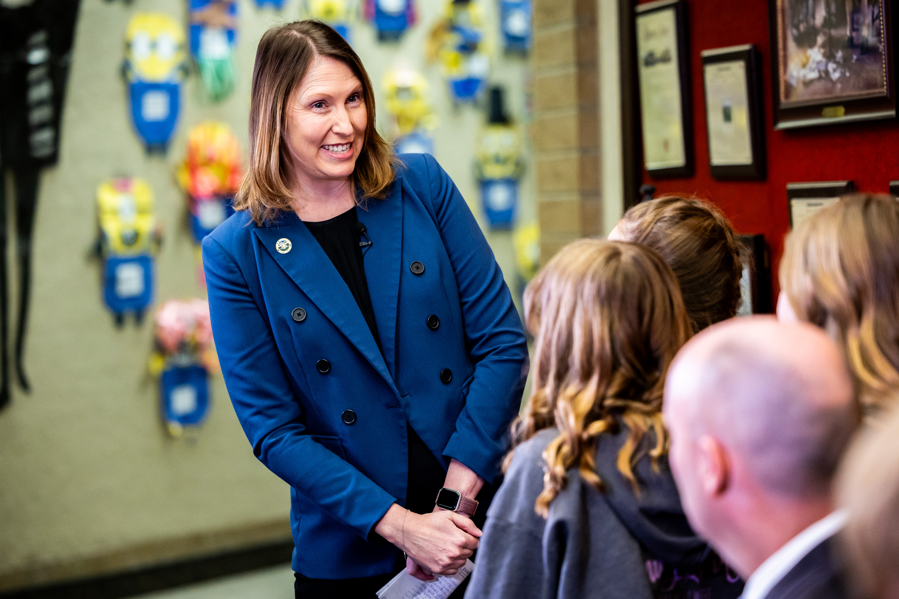 Rep. Karen Peterson, R-Clinton, talks with students as Gov. Spencer Cox holds a press conference to support Utah’s rural schools at Manti Elementary School in Manti  on March 24, 2025. Peterson won't seek reelection next year.