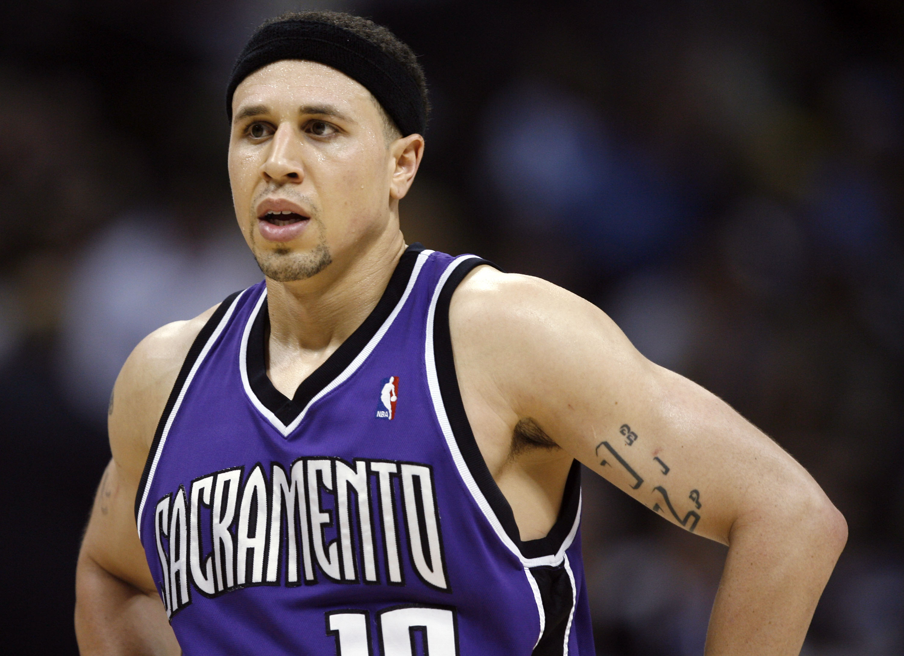 FILE - Sacramento Kings guard Mike Bibby stands on the court as time runs out during an NBA basketball game against the Denver Nuggets, on April 4, 2007, in Denver.
