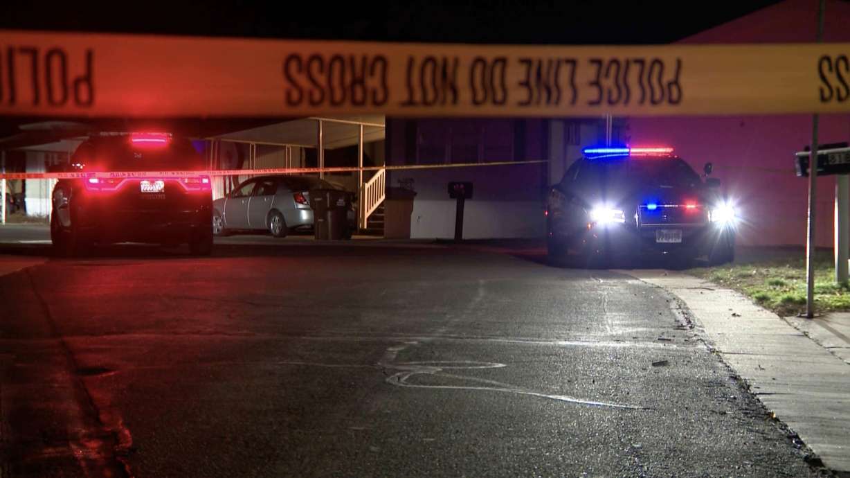 Police investigate after a woman was found dead inside a burned mobile home at 1050 W. 5100 South in Riverdale on Monday. Shortly after the body was found, an Amber Alert was issued for the woman's children, who were later found safe.