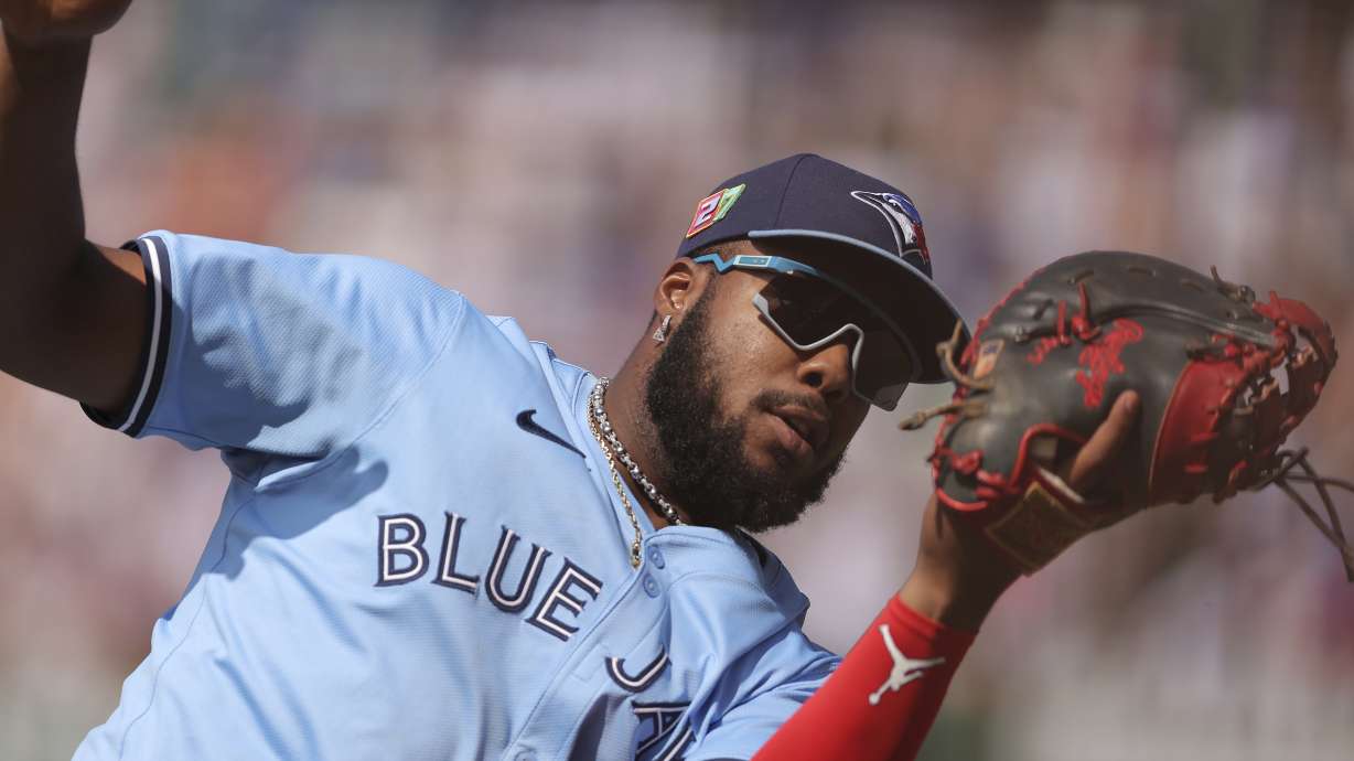 FILE - Toronto Blue Jays' Vladimir Guerrero Jr. makes a catch during the seventh inning of a baseball game against the Chicago Cubs, Sunday, Aug. 18, 2024, in Chicago.