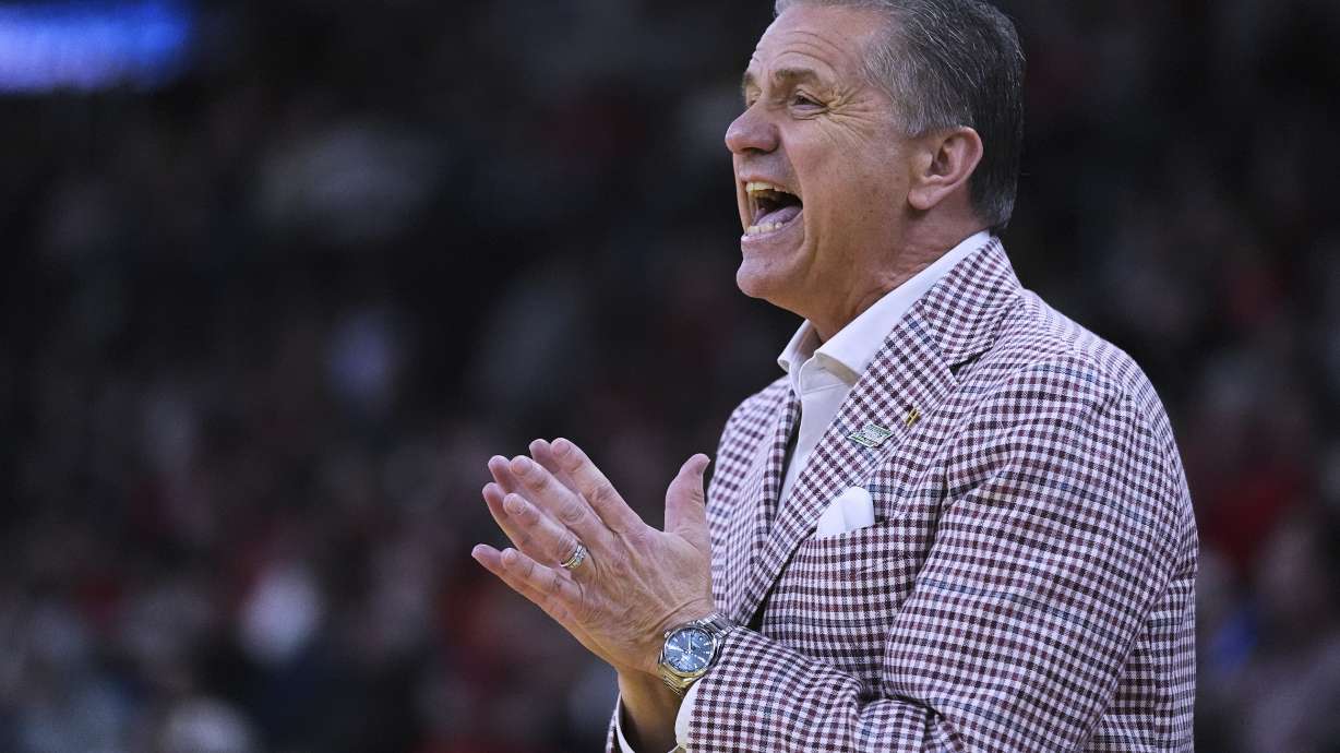 Arkansas head coach John Calipari calls to his players during the first half in the second round of the NCAA college basketball tournament, Saturday, March 22, 2025, in Providence, R.I.