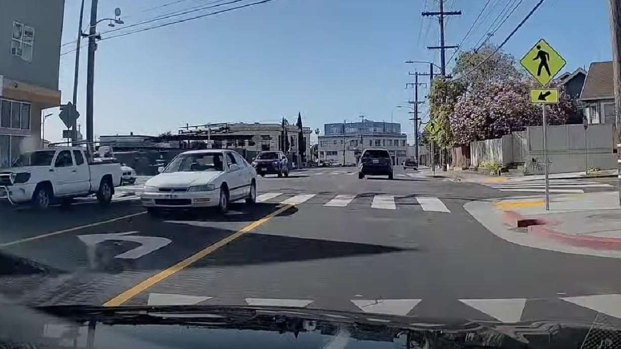A driver speeds by in reverse in Oakland, California, on Feb. 14.