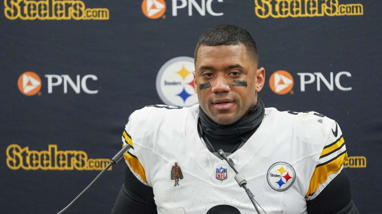 FILE - Pittsburgh Steelers quarterback Russell Wilson talks to reporters following an NFL wild-card playoff football game against the Baltimore Ravens, Saturday, Jan. 11, 2025, in Baltimore.