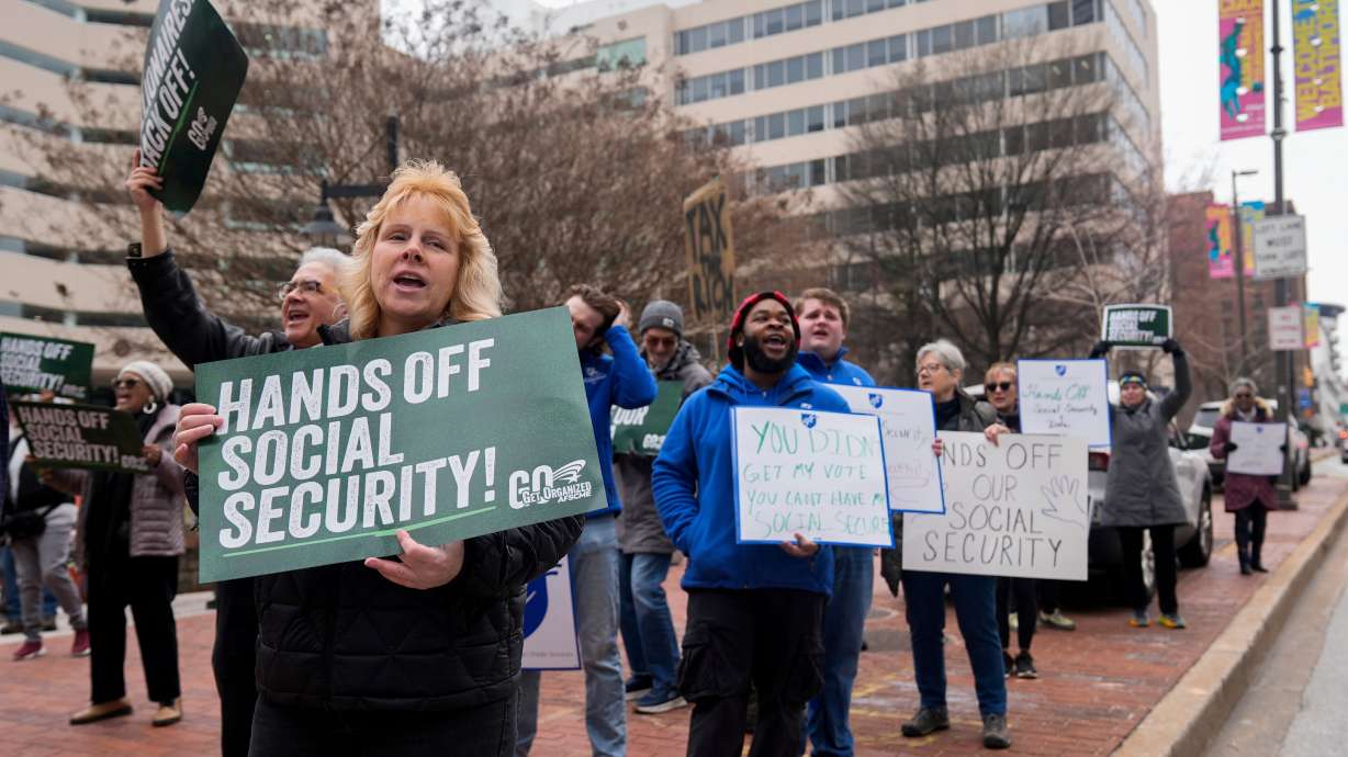 Demonstrators gather outside of the Edward A. Garmatz United States District Courthouse in Baltimore, Md., on March 14, before a hearing regarding the Department of Government Efficiency's access to Social Security data. Utah Sen. John Curtis seeks changes to make Social Security more sustainable.