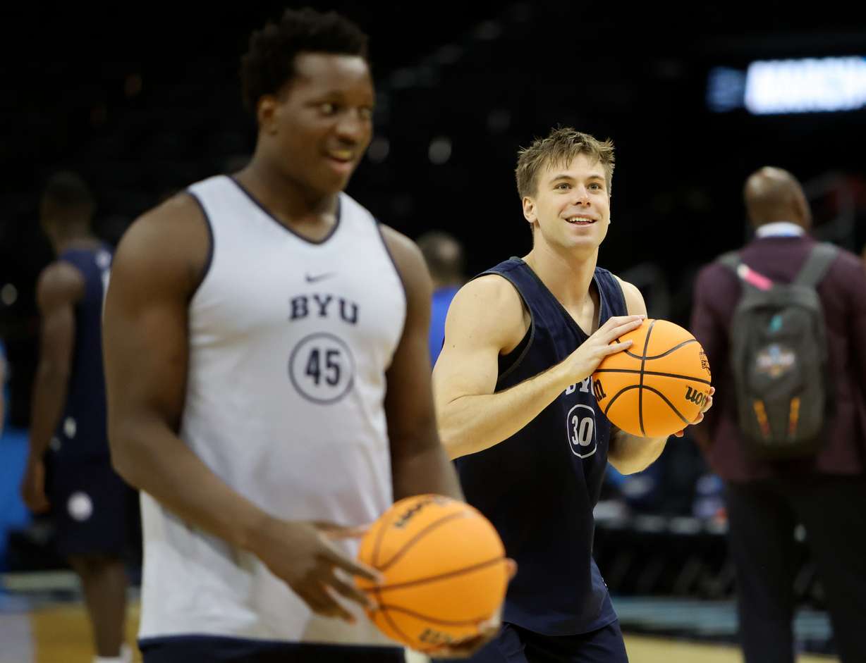 Brigham Young center Fousseyni Traore (45) and guard Dallin Hall (30) practice for the upcoming NCAA Sweet 16 basketball game against Alabama at the Prudential Center in Newark, N.J., on Wednesday, March 26, 2025.