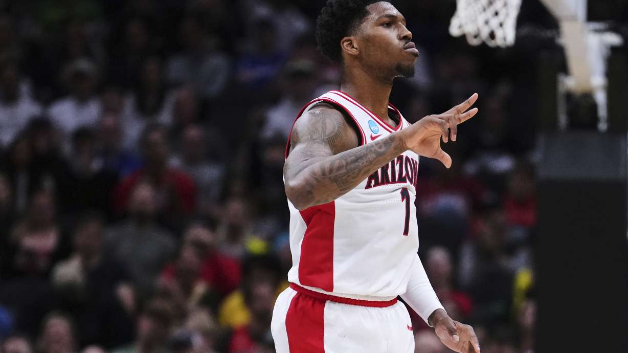 Arizona guard Caleb Love reacts after a basket against Oregon during the second half in the second round of the NCAA college basketball tournament, Sunday, March 23, 2025 in Seattle.