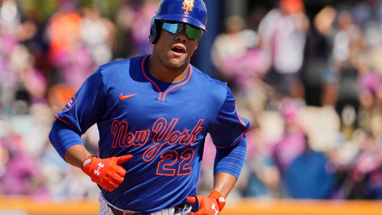 FILE - New York Mets' Juan Soto rounds the bases after hitting a solo home run during the first inning of a spring training baseball game against the Houston Astros, Saturday, Feb. 22, 2025, in Port St. Lucie, Fla.
