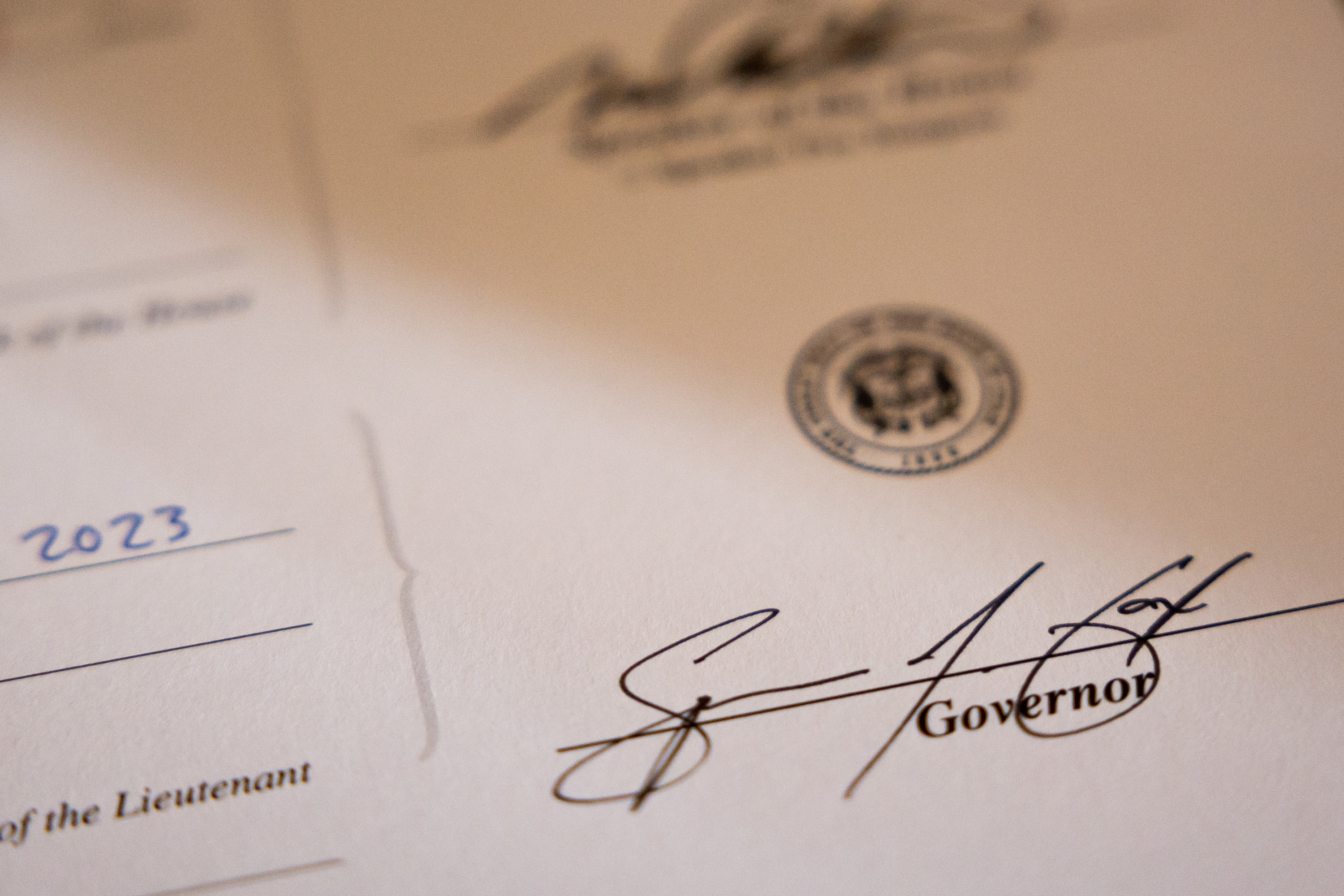 Gov. Spencer Cox’s signature is seen on HB54 at the Capitol in Salt Lake City on March 22, 2023. Cox signed 100 newly passed bills Wednesday, codifying a $127 million cut to state income tax, among other laws.
