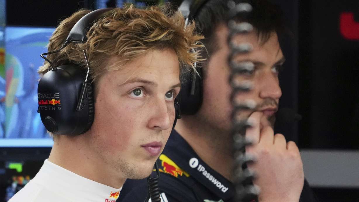 Red Bull driver Liam Lawson of New Zealand waits in his team garage during the third practice session at the Australian Formula One Grand Prix at Albert Park, in Melbourne, Australia, Saturday, March 15, 2025.