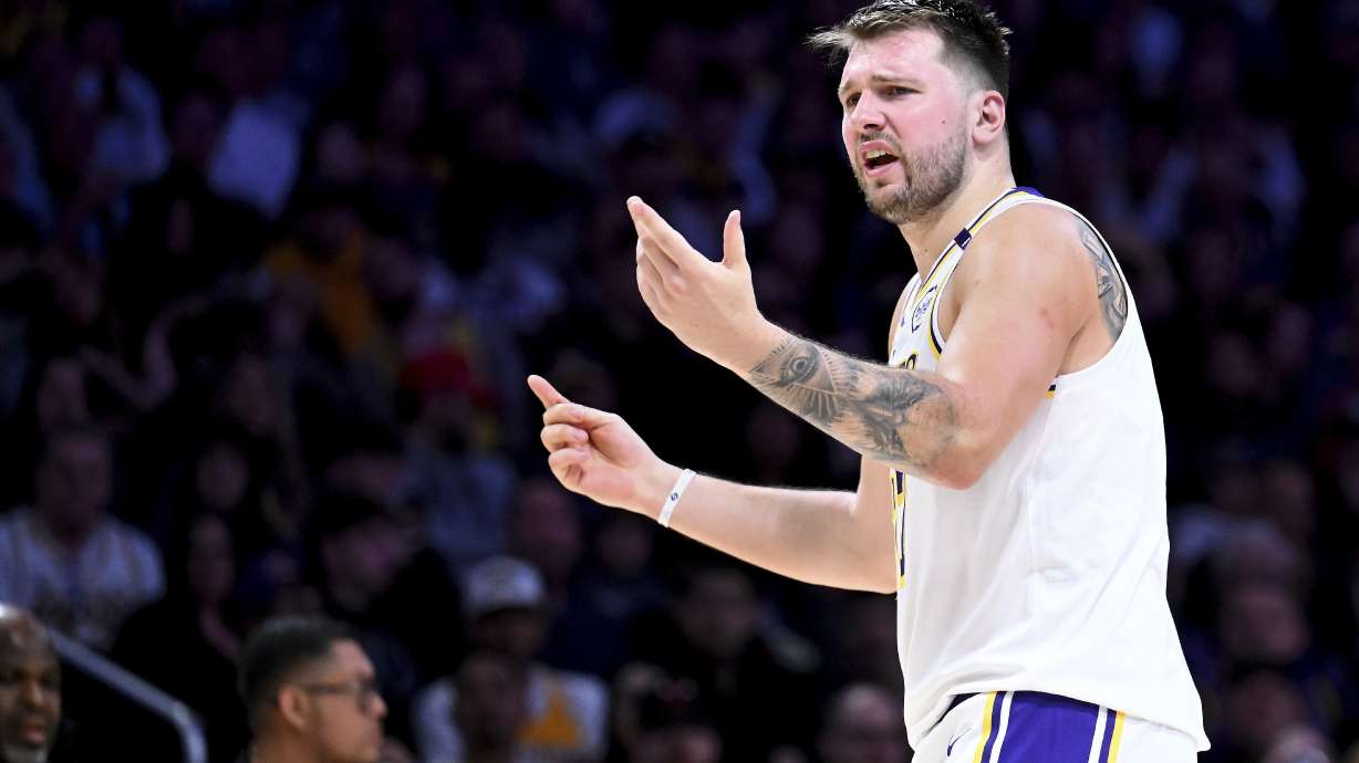 Los Angeles Lakers guard Luka Doncic (77) reacts against the Chicago Bulls in the second half of an NBA basketball game Saturday, March 22, 2025, in Los Angeles.