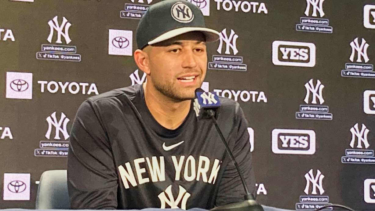 New York Yankees' J.C. Escarra speaks during a press conference before an opening-day baseball game against the Milwaukee Brewers, Thursday, March 27, 2025, in New York.