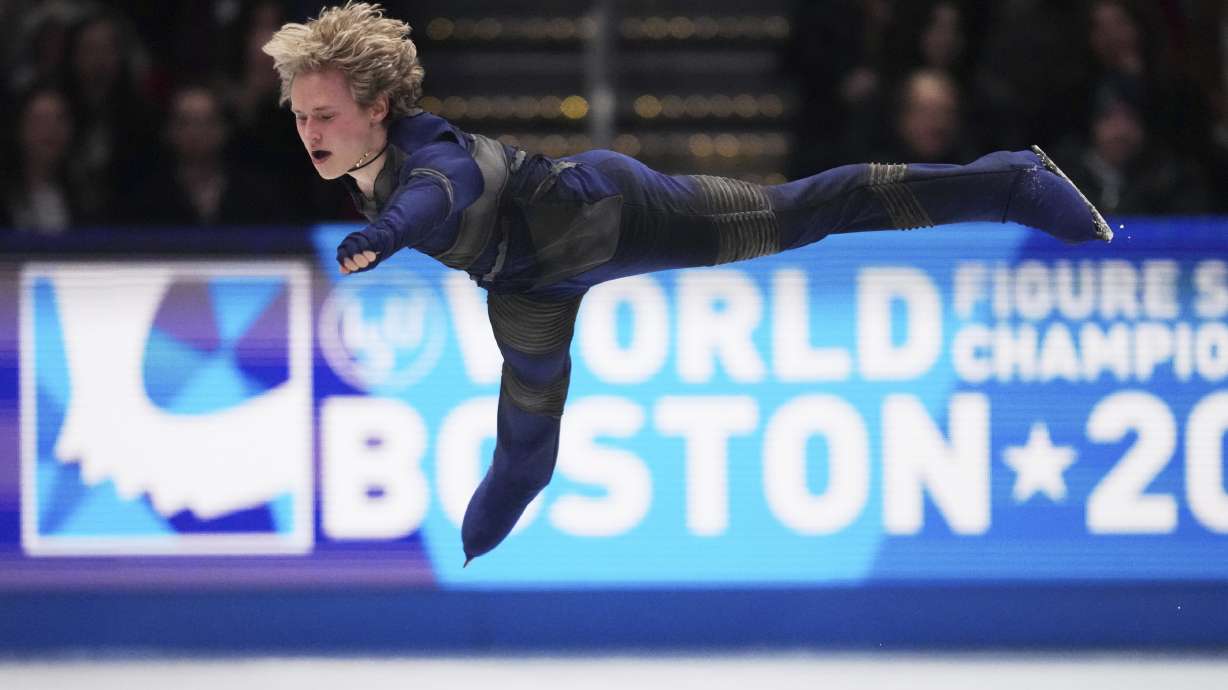 Ilia Malinin, of the United States, skates during the men's short program at the figure skating world championships, Thursday, March 27, 2025, in Boston.