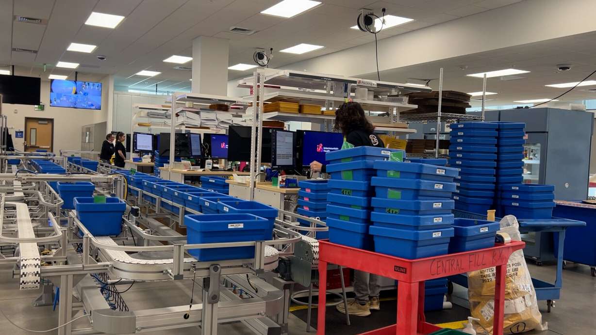 Intermountain Health workers filling out orders at the Supply Chain Center.
