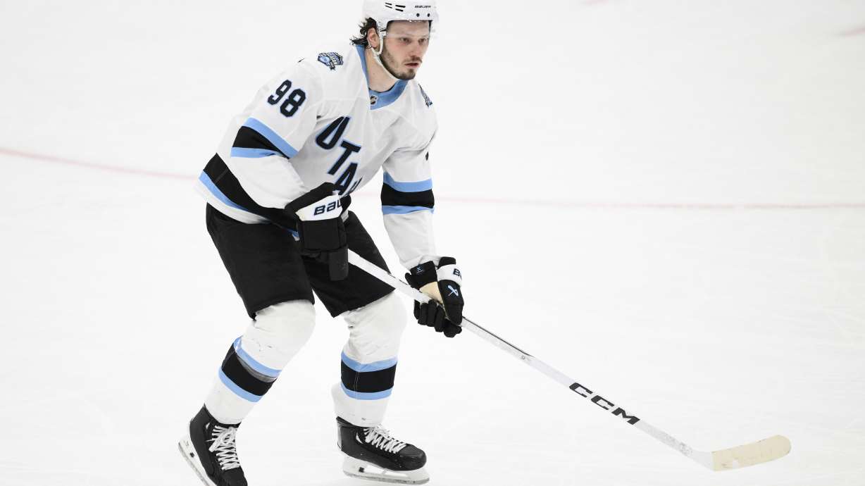 Utah Hockey Club defenseman Mikhail Sergachev (98) in action during overtime of an NHL hockey game against the Washington Capitals, Sunday, Feb. 9, 2025, in Washington.