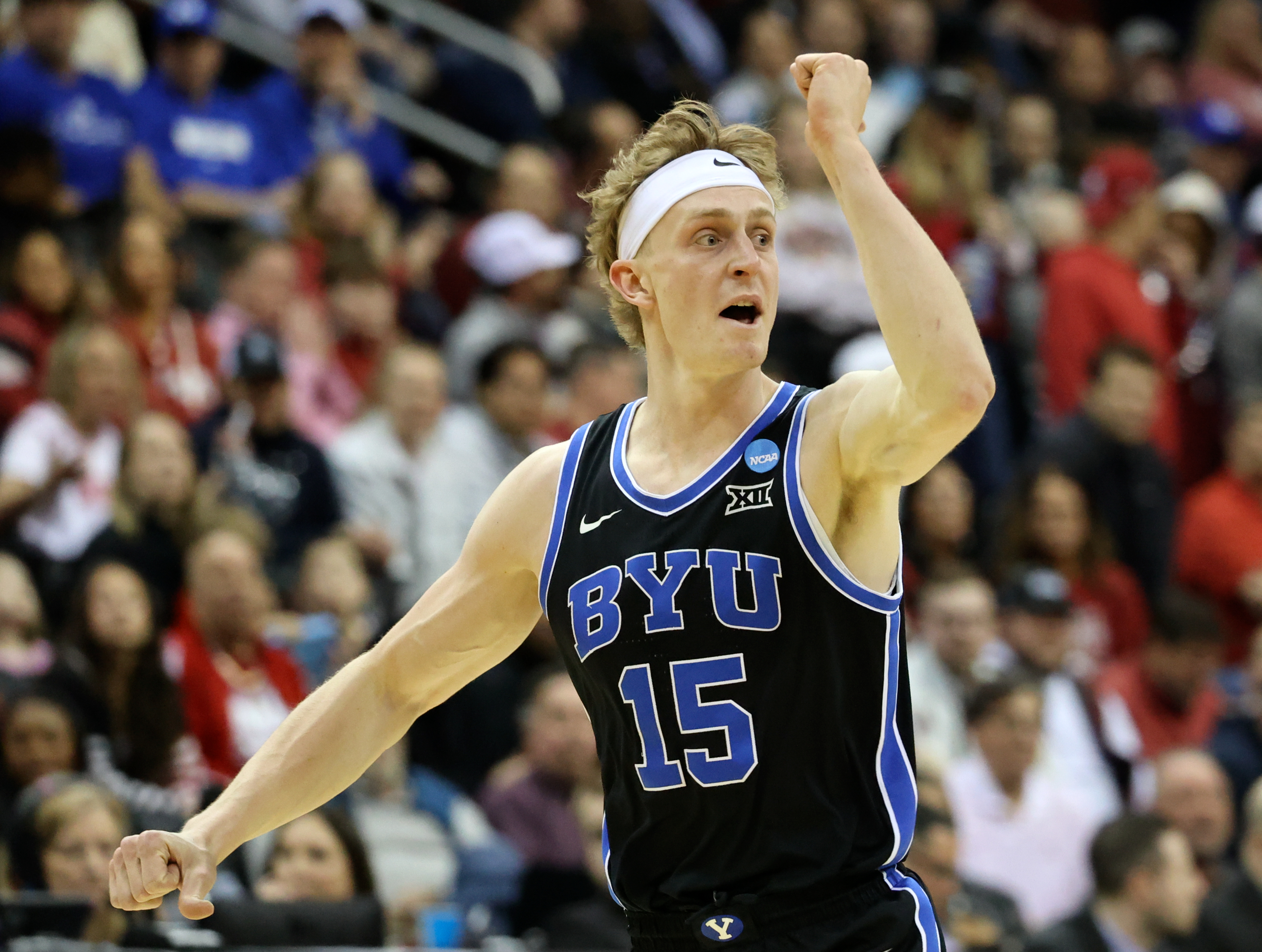 Brigham Young forward Richie Saunders (15) yells to his teammates as the Cougars play the Alabama Crimson Tide in the first half of an NCAA Sweet 16 basketball game at the Prudential Center in Newark, N.J., on Thursday, March 27, 2025. BYU lost 113-88.