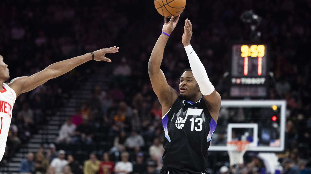 Utah Jazz guard Isaiah Collier (13) puts up a 3-pointer shot during an NBA game between the Utah Jazz and the Houston Rockets at the Delta Center in Salt Lake City on Thursday, March 27, 2025.