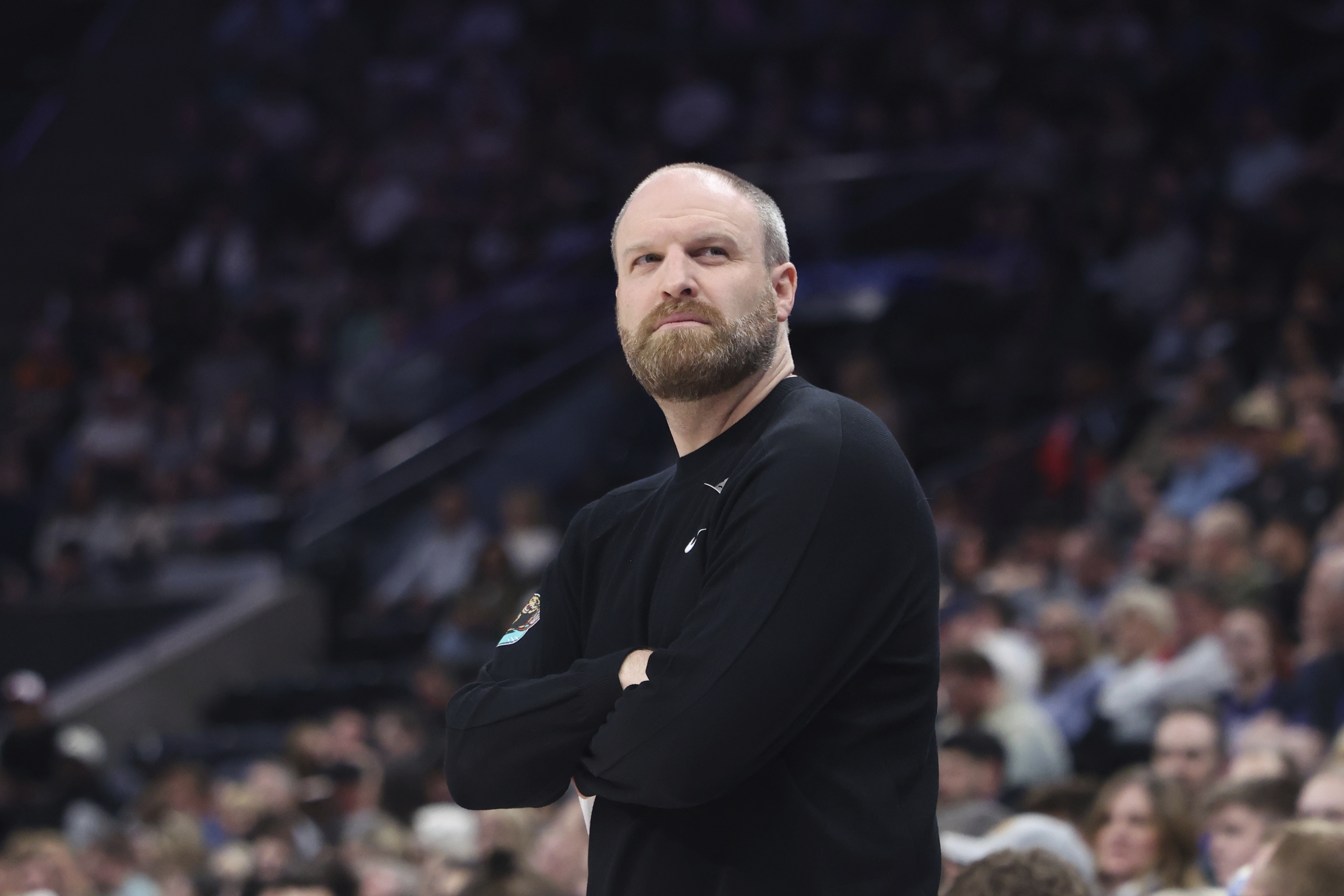 Memphis Grizzlies head coach Taylor Jenkins looks on during the first half of an NBA basketball game against the Utah Jazz, Tuesday, March 25, 2025, in Salt Lake City.