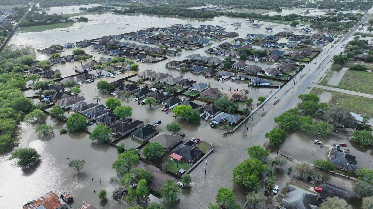 Streets are flooded Friday following Thursday's severe thunderstorms that passed Primera, Texas. At least four people have died, including some who drowned.