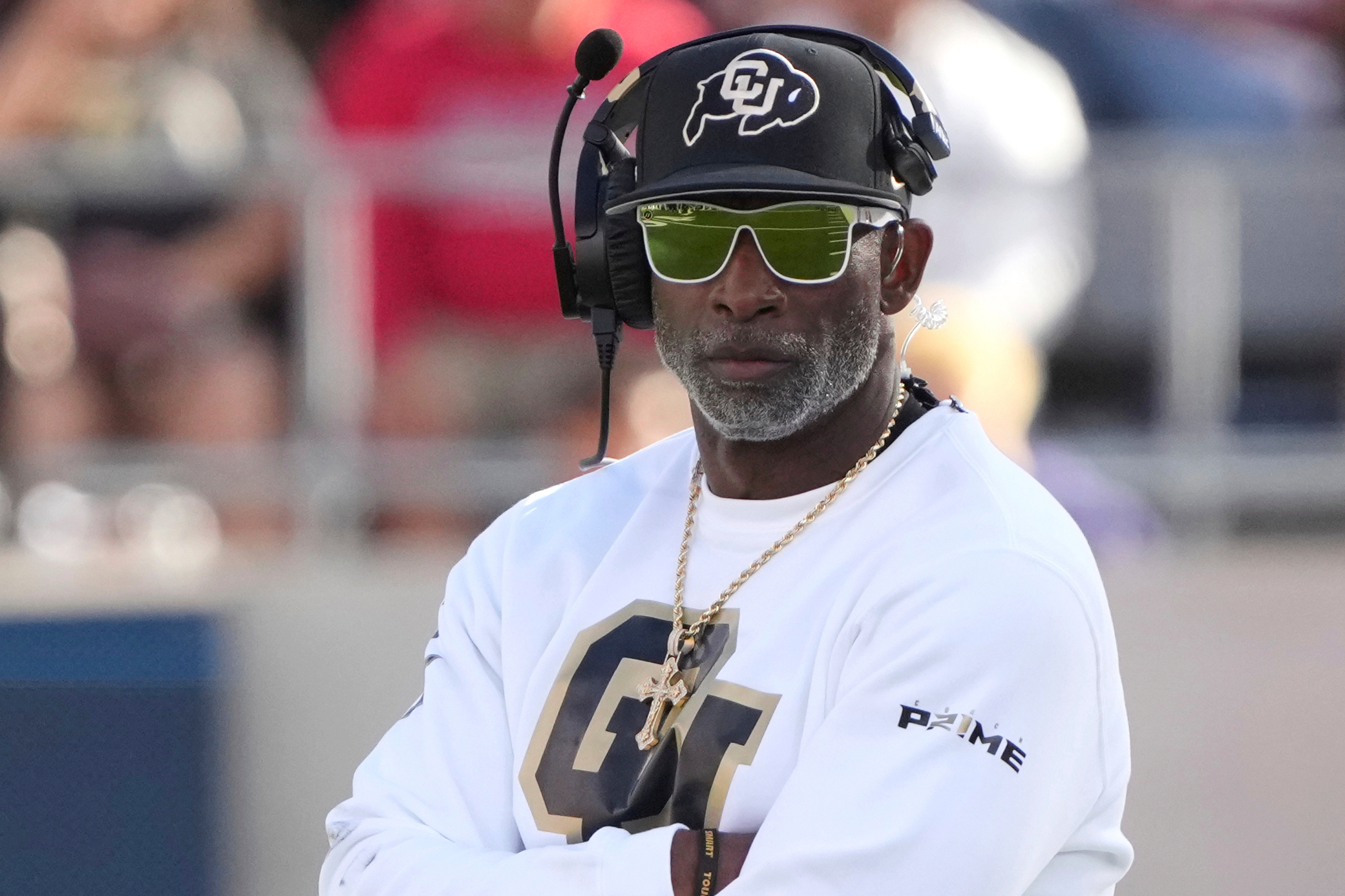 FILE - Colorado head coach Deion Sanders watches during the first half during an NCAA college football game against Arizona, Saturday, Oct. 19, 2024, in Tucson, Ariz.