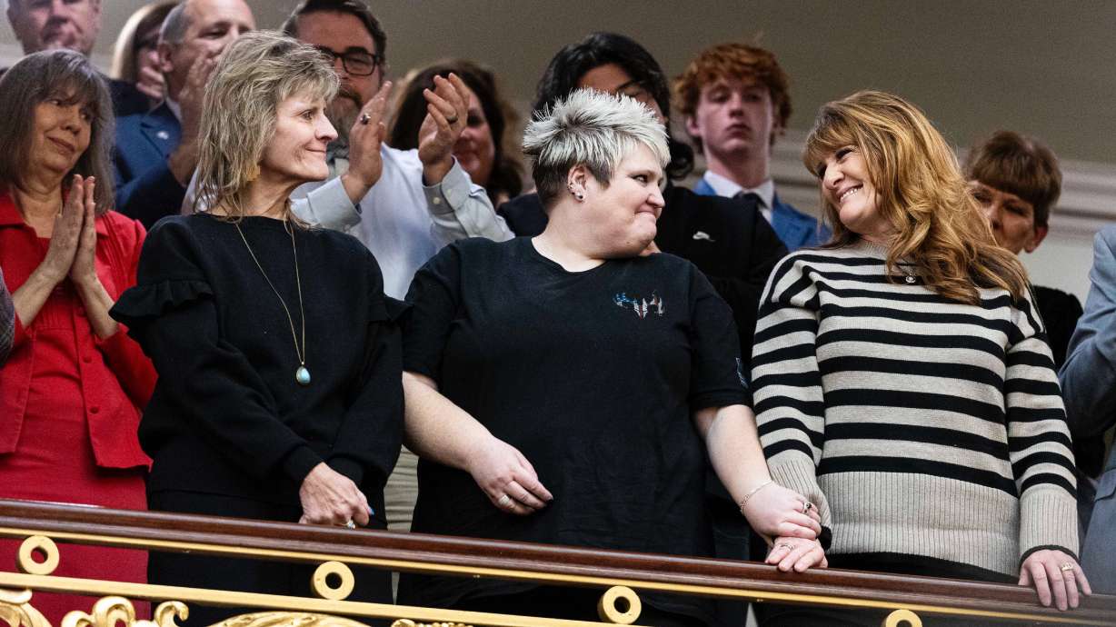 Merrilee Gardner, Jennifer Nelson and Deborah Borgstrom Long at the state Capitol in Salt Lake City on Jan. 23, when Gov. Spencer Cox noted the deaths of the four Borgstrom brothers during World War II.