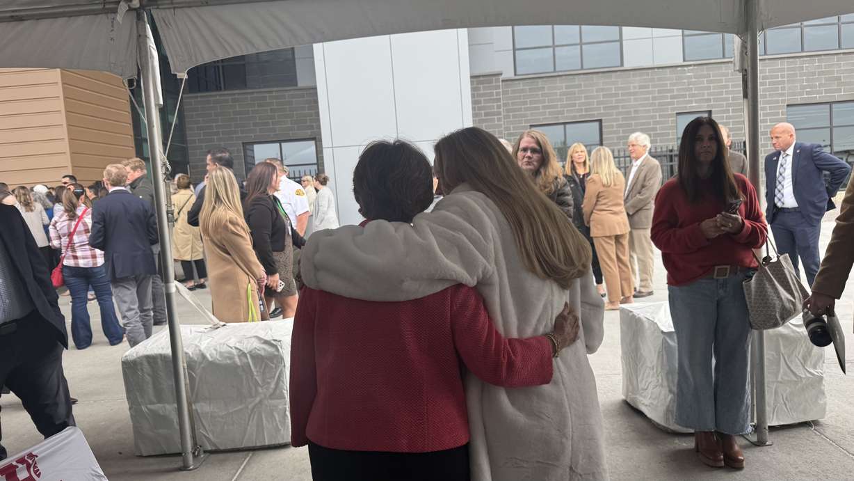 Karen Huntsman walks with her daughter, Christena Huntsman Durham, during a ribbon-cutting ceremony at the Kem and Carolyn Gardner Mental Health Crisis Care Center in South Salt Lake on Friday. The facility will provide 24/7 emergency mental health care.