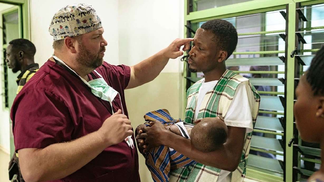 Utah Dr. Dayne Jensen attends to a patient during the Ghana Make a Difference medical mission to Ghana in October 2024. A Utah-heavy contingent of health care workers like Jensen will travel to Ghana in April to provide free medical care to those in need.
