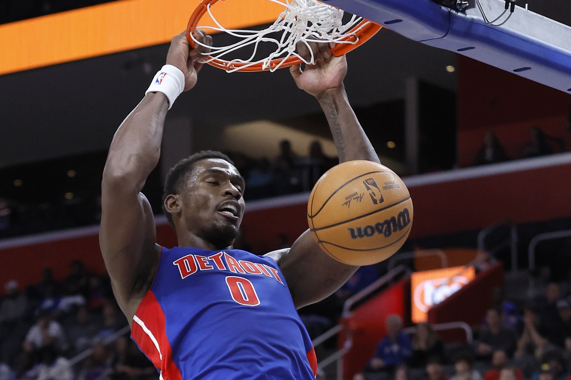 Detroit Pistons center Jalen Duren (0) dunks against the Cleveland Cavaliers during the first half of an NBA basketball game Friday, March 28, 2025, in Detroit. 