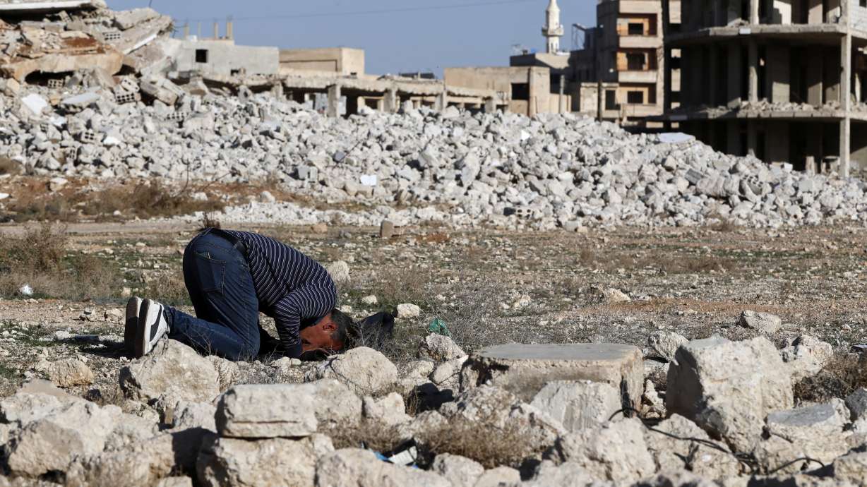 Saeed Kamel, who recently returned after the fall of Bashar Assad, prays in a destroyed area of Daraya, Syria, on March 17. Located in rural Damascus, Daraya was a key center of the uprising against Assad and endured heavy casualties and widespread destruction during the conflict.