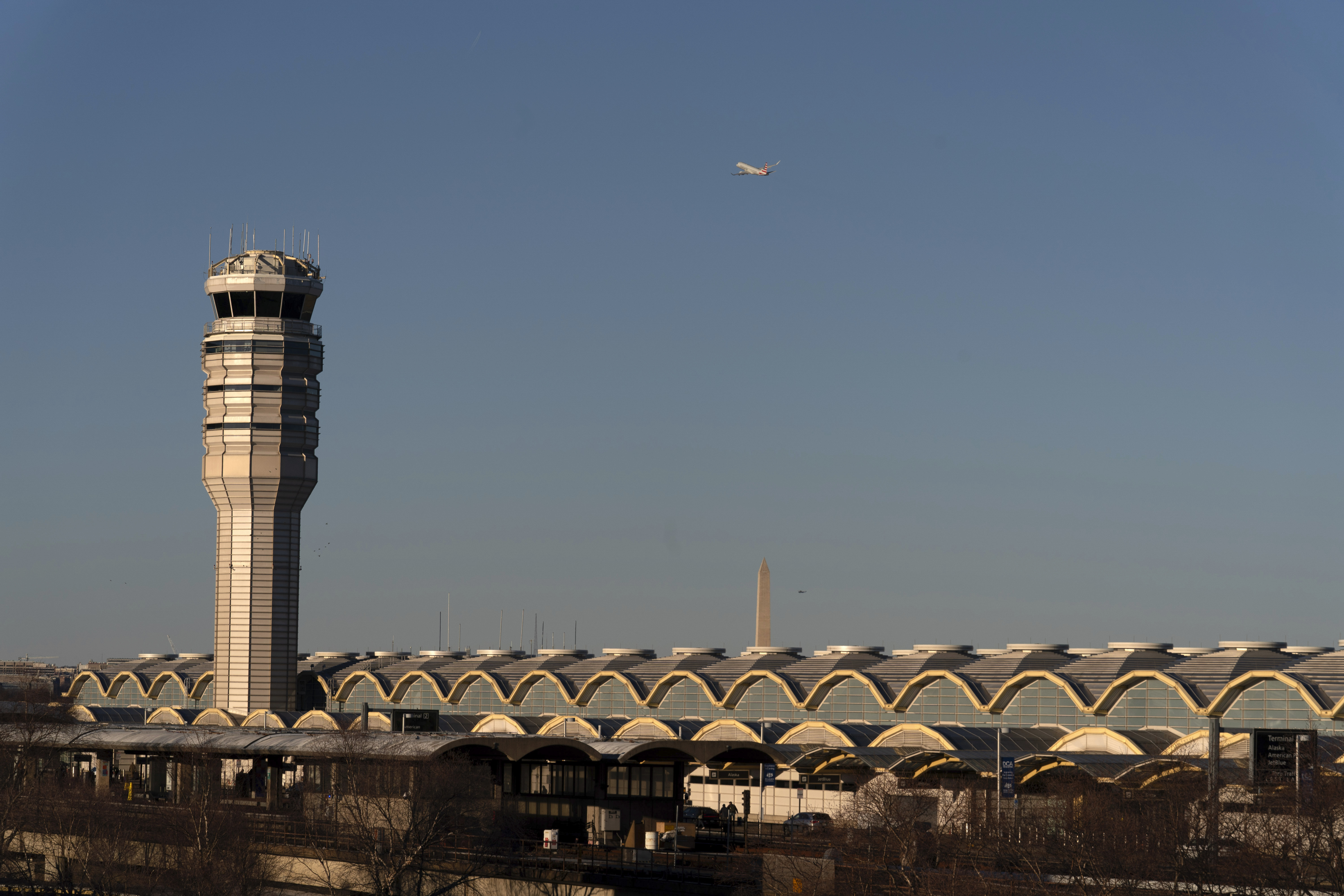 The air traffic control tower at Ronald Reagan Washington National Airport on Feb. 1. A U.S. passenger flight preparing to leave the nation's capital and an incoming military jet received instructions to divert and prevent a possible collision Friday.