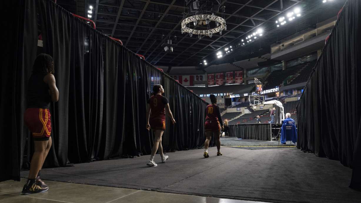 Southern California players walk to the court for practice before the Sweet 16 of the NCAA college basketball tournament Friday, March 28, 2025, in Spokane, Wash.