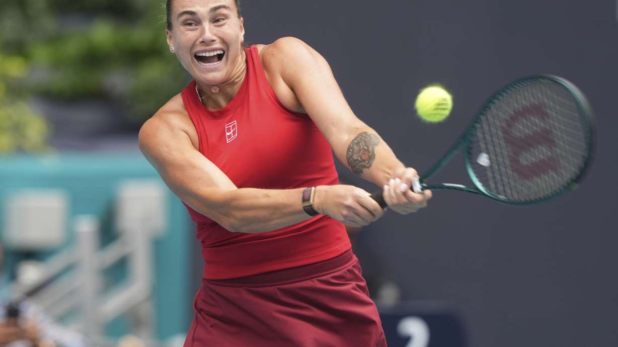 Aryna Sabalenka hits a return to Jessica Pegula during the women's singles final match at the Miami Open tennis tournament, Saturday, March 29, 2025, in Miami Gardens, Fla.