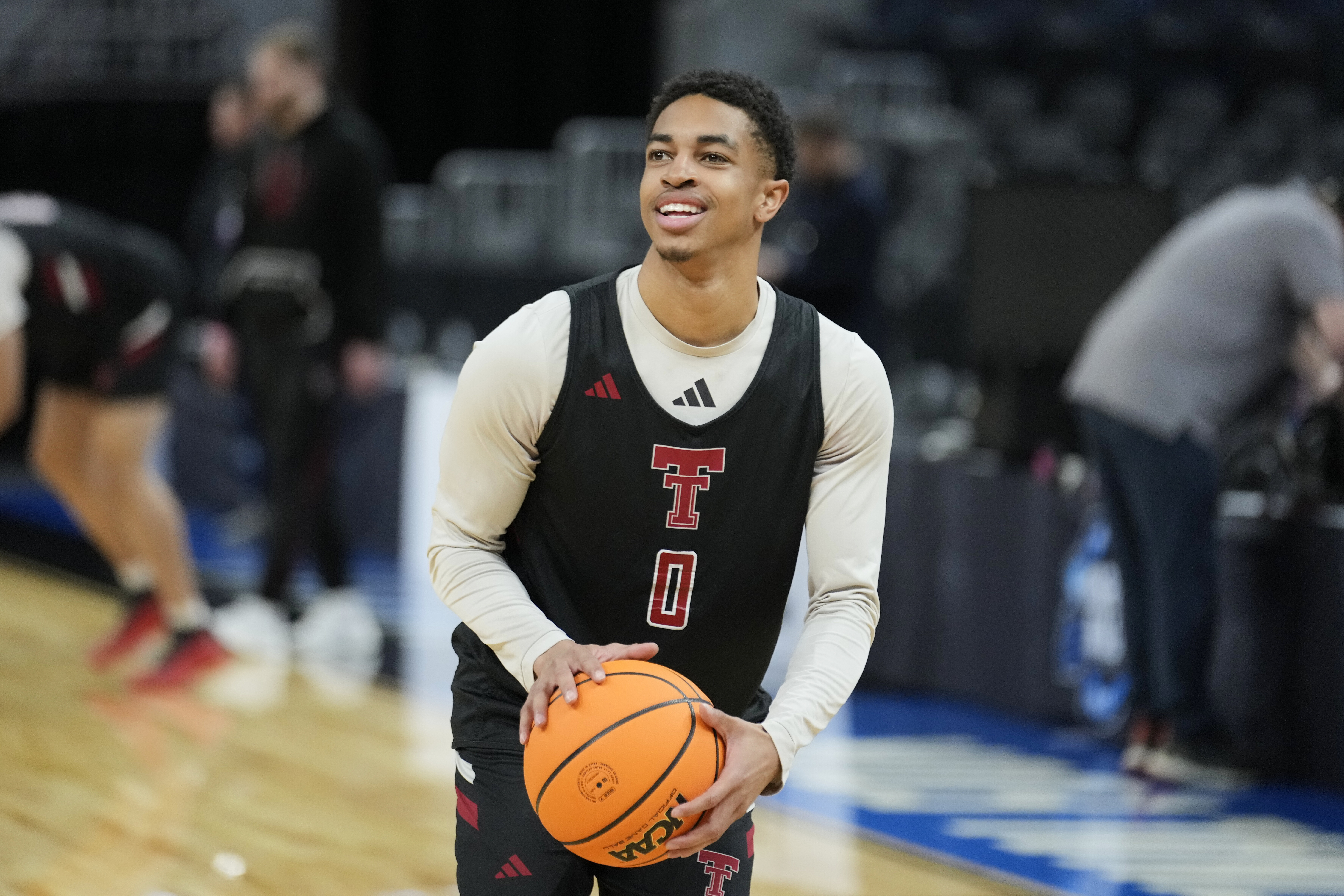 Texas Tech guard Chance McMillian (0) prepares to shoot during practice Wednesday, March 26, 2025, in San Francisco, ahead of a Sweet 16 game against Arkansas in the NCAA college basketball tournament.
