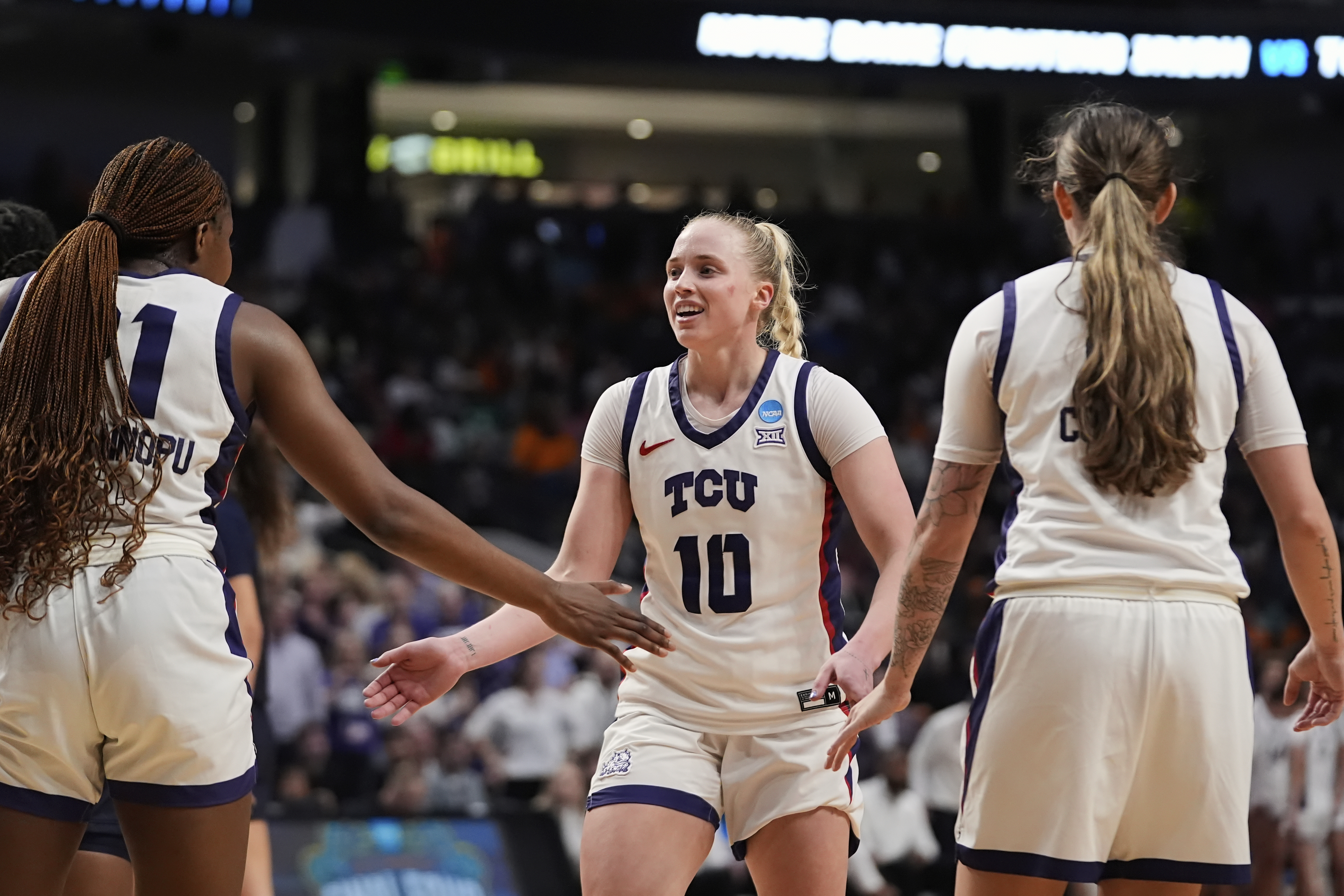 TCU guard Hailey Van Lith (10) celebrates with teammates during the second half against Notre Dame in the Sweet 16 of the NCAA college basketball tournament, Saturday, March 29, 2025. in Birmingham, Ala.