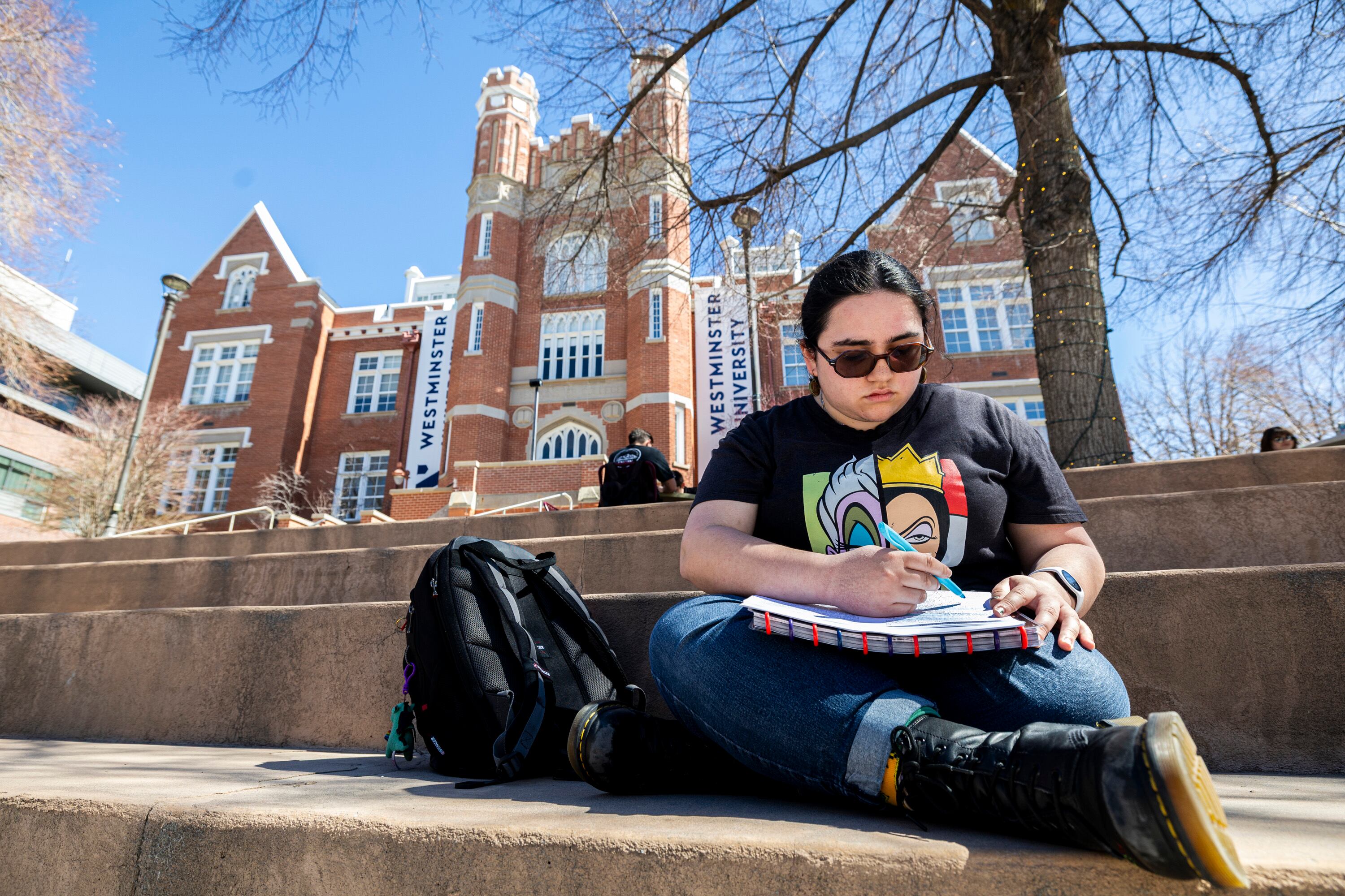 Arabella Martin, a freshman studying computer science, studies on the campus of Westminster University in Salt Lake City on March 26. The school is celebrating its sesquicentennial.
