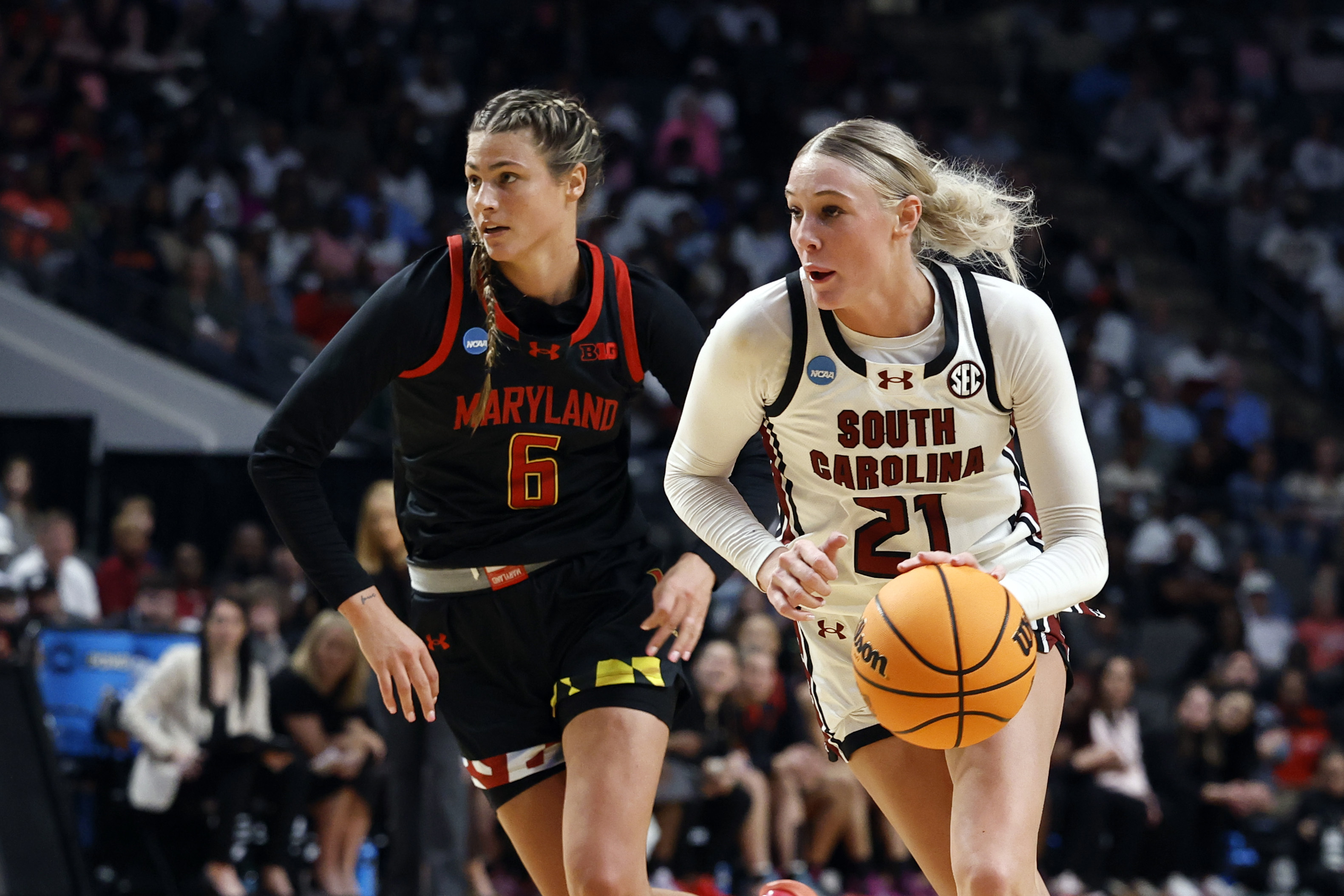 South Carolina forward Chloe Kitts (21) dribbles around Maryland guard Saylor Poffenbarger (6) during the second half in the Sweet 16 of the NCAA college basketball tournament, Friday, March 28, 2025, in Birmingham, Ala.