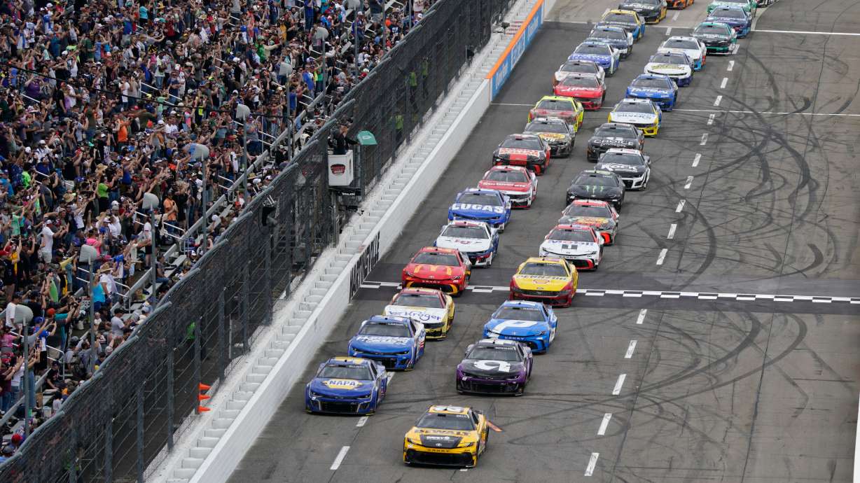 Joey Logano (22) leads the field into Turn 1 at the start of a NASCAR Cup Series auto race in Martinsville, Va., Sunday, March 30, 2025.