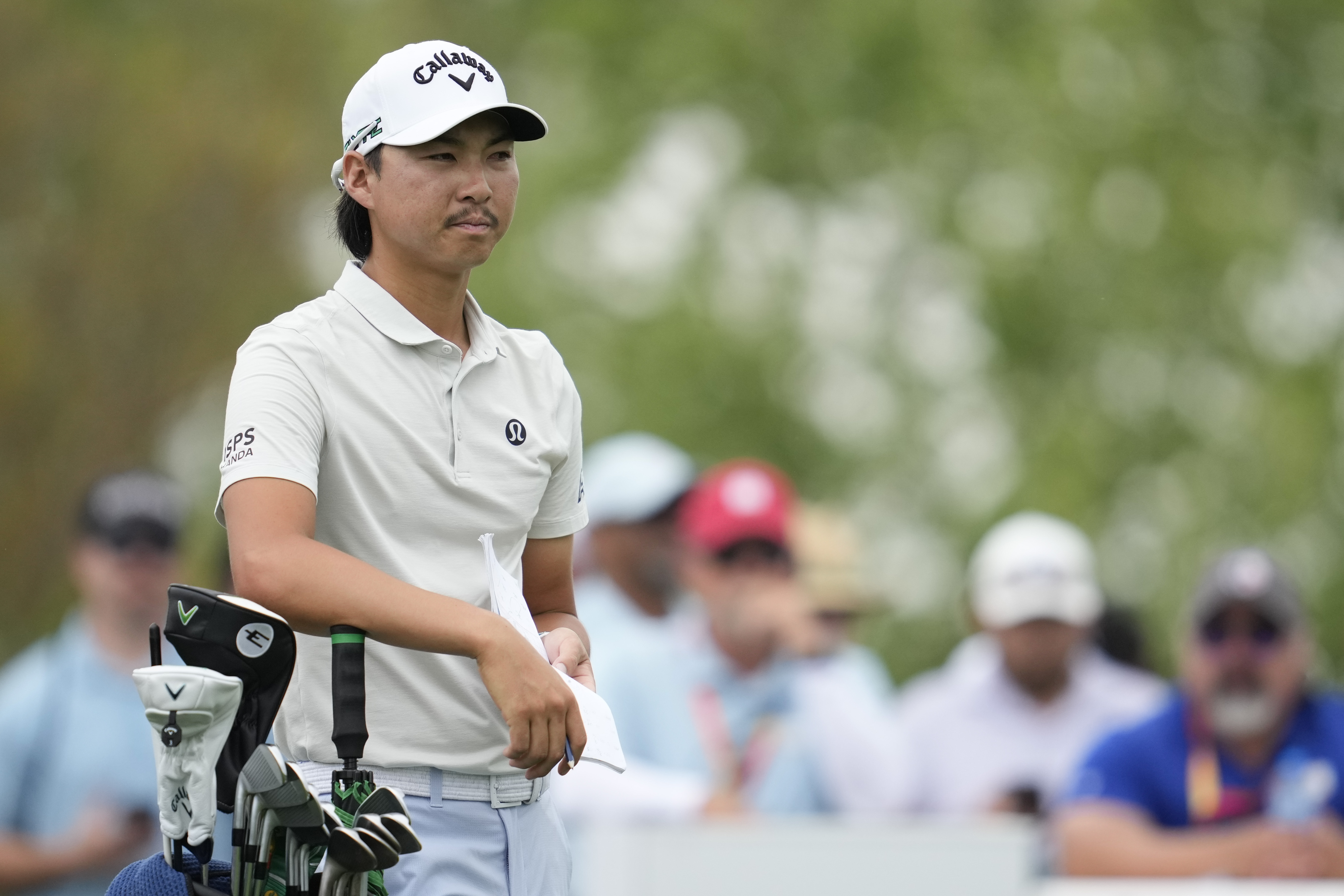 Min Woo Lee, of Australia, waits for his turn to hit from the second tee during the final round of the Houston Open golf tournament in Houston, Sunday, March 30, 2025.