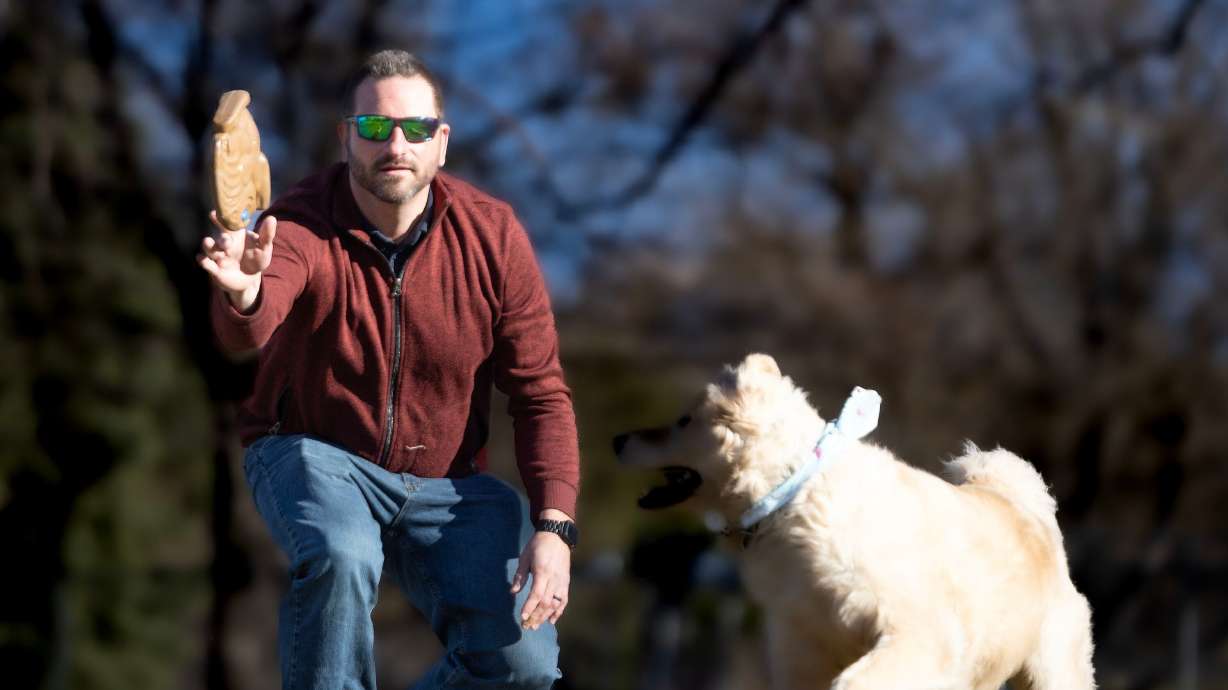 Ryan Benitez throws a Wobble Wag SquWhirl at Lindsey Gardens in Salt Lake City, March 12.